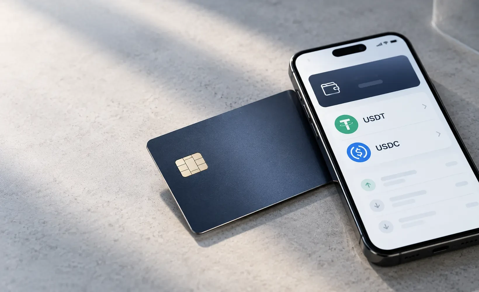 深色银行卡与显示 USDT、USDC 稳定币资产的智能手机,展示加密支付卡充值主题